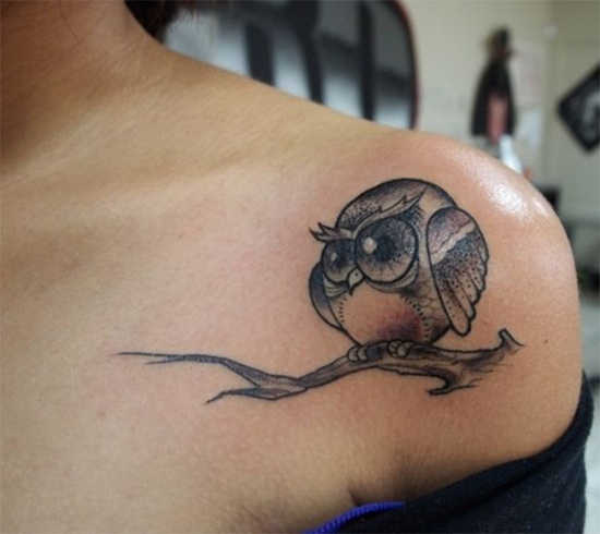 Cool owl tattoo on collar bone