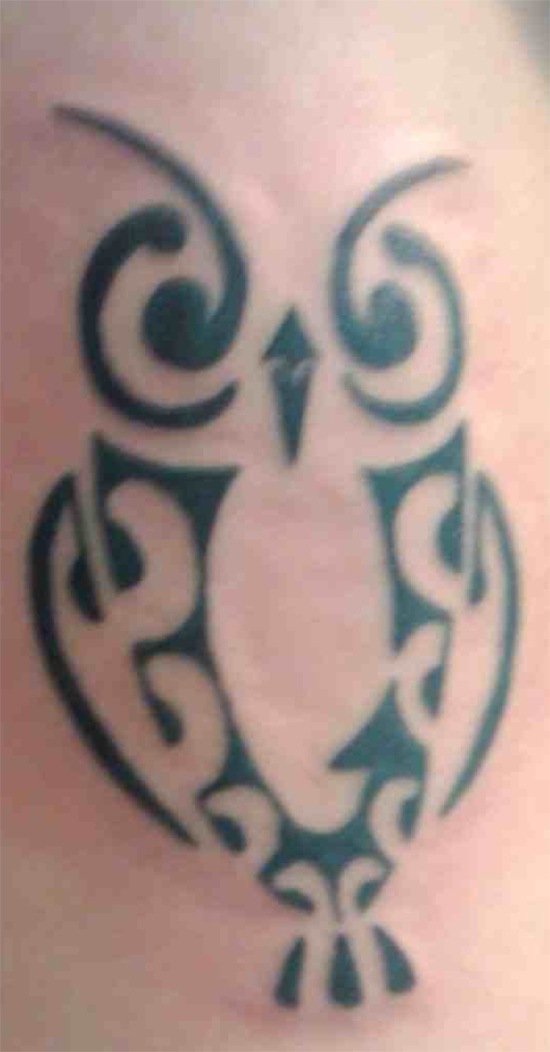 Tribal owl tattoo