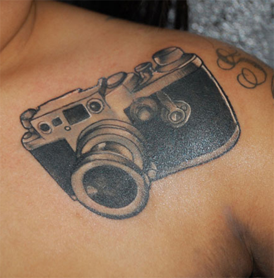 Camera Tattoo On Collarbone