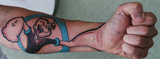 Crazy Popeye Tattoo On Forearm