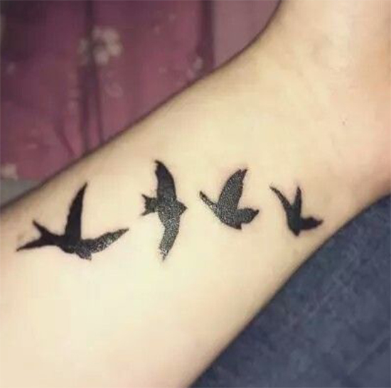 Elegant Birds Tattoo