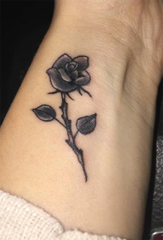 Elegant Small Rose Tattoo
