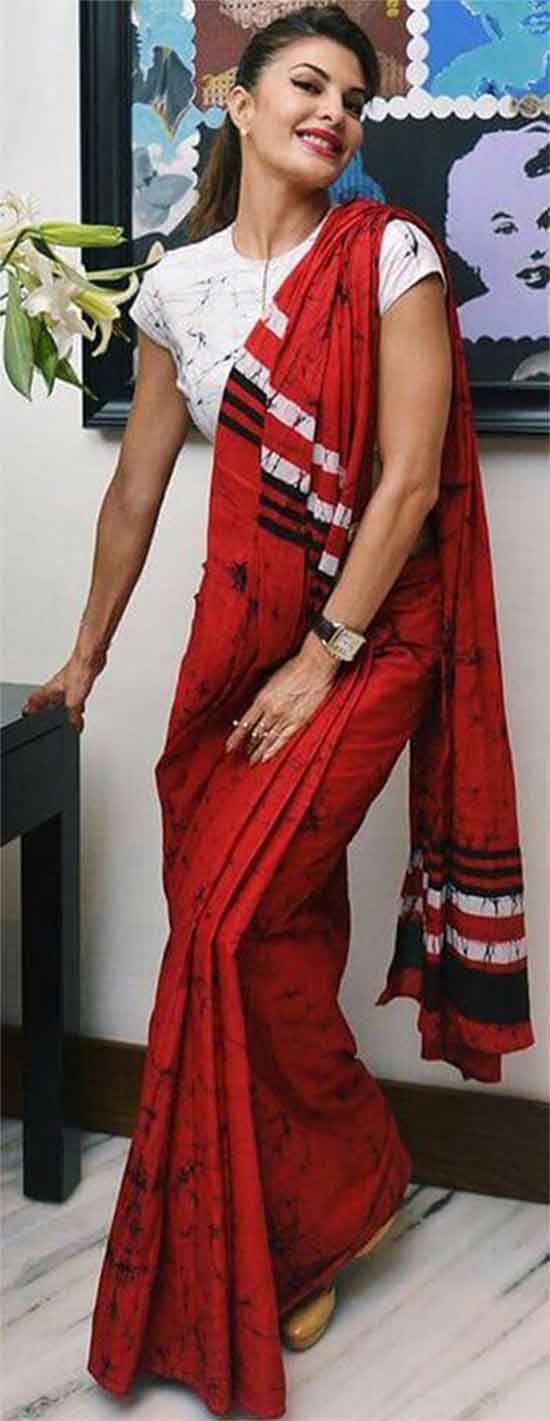 Jacqueline Fernandez In Red Saree With White T- Shirt Blouse