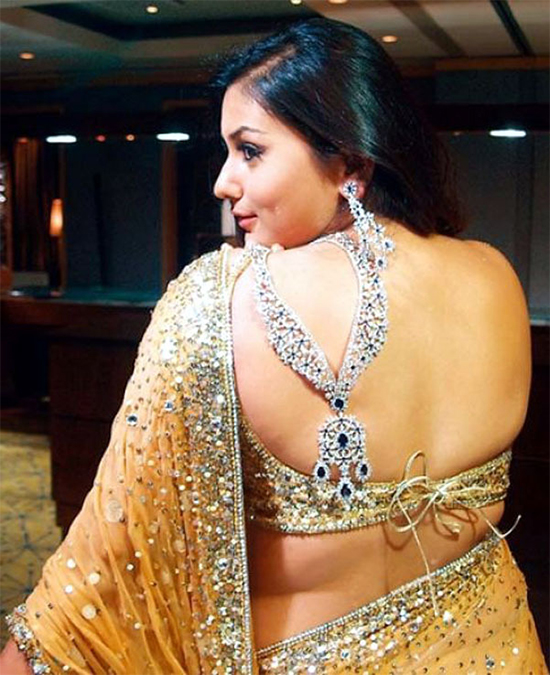 Namitha in a beautiful golden colour saree