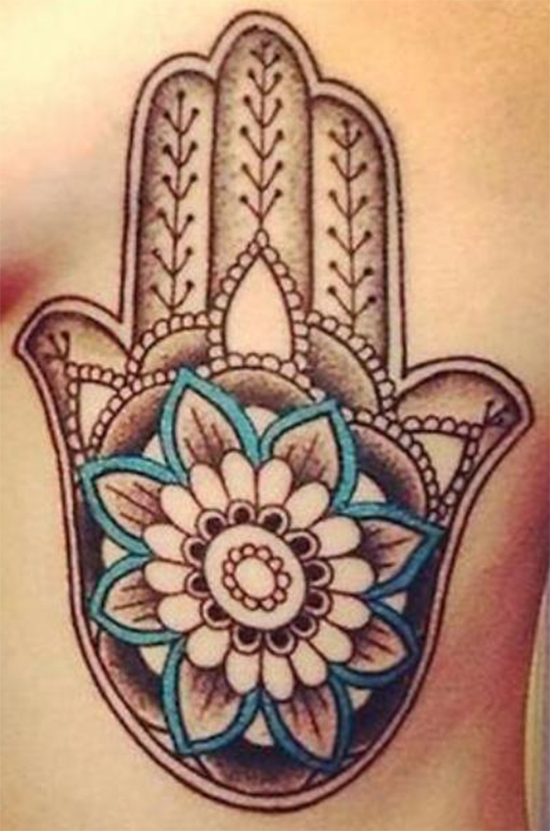 Perfectly Lotus Flower Rib Tattoo