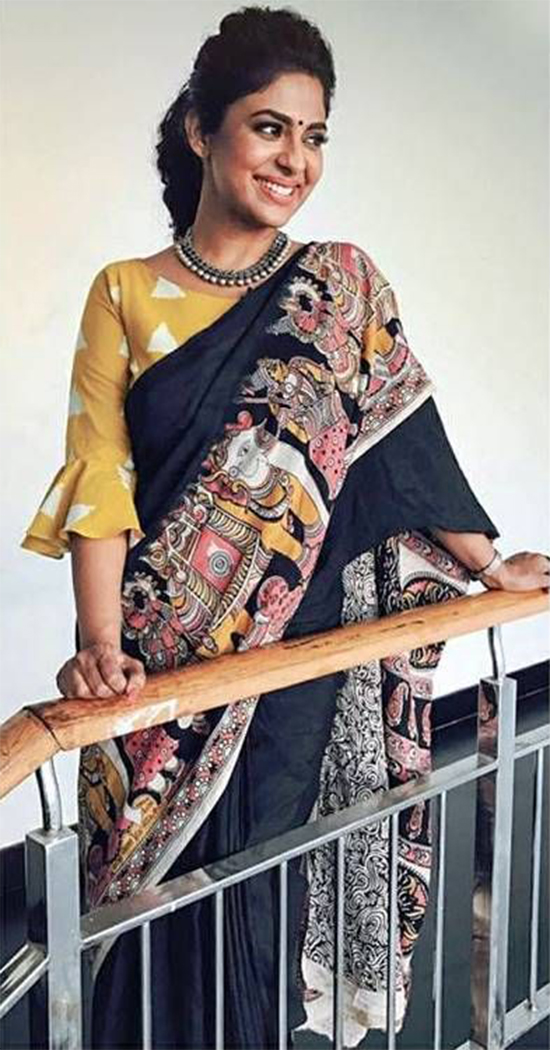 Poornima Indrajith In Black Kalamkari Printed Saree With Triangle Printed Blouse