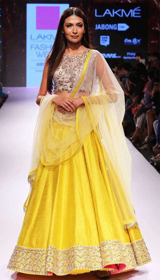 Simple & Sober Bright Yellow Designer Lehenga With Embroidered Blouse & Netted Choli