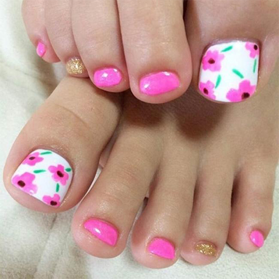 Pink Floral Toe Nail Design With A Bit Of Gold Glitters.